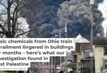 A black plume of smoke spreads out from burning railcars. AP Photo/Gene J. Puskar